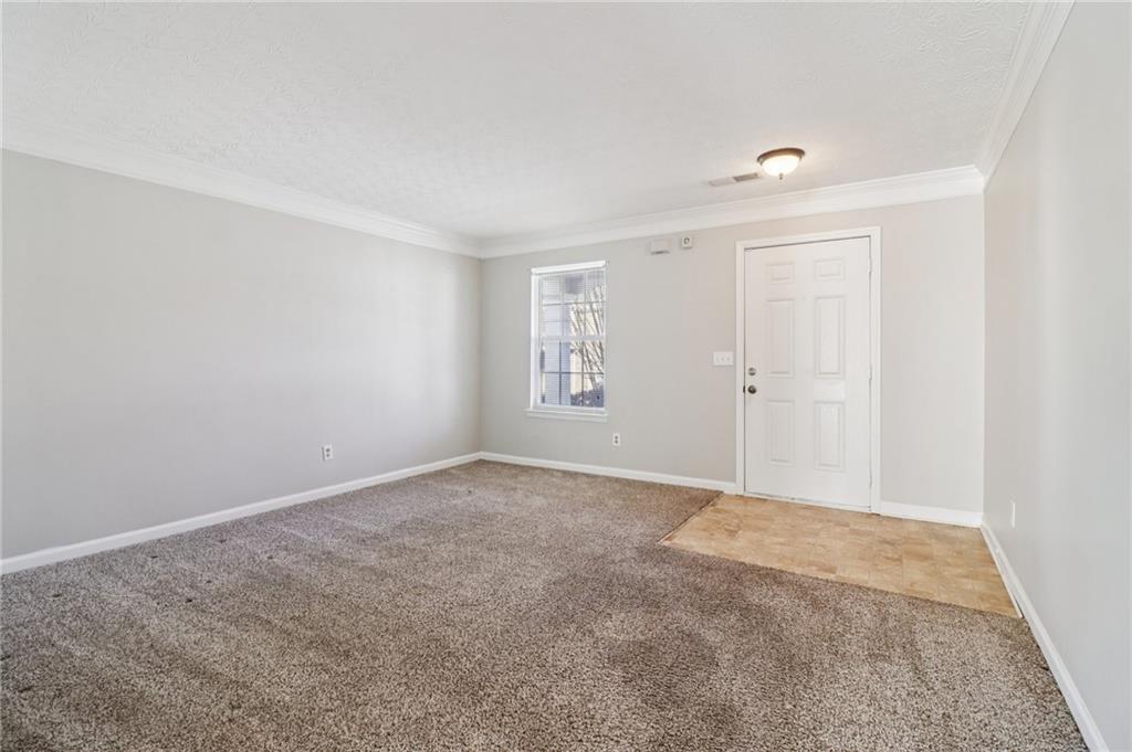 3118 Farmstead Court Grayson, GA 30017 - Photo 10 of 55 an empty room with windows