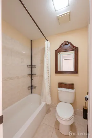 a bathroom with a toilet sink and bathtub