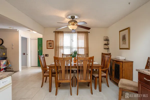a view of a dining room with furniture