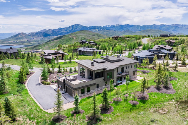 140 West Vista Road Kamas, UT 84036 - Photo 95 of 101 Contemporary residence with a flat roof design, expansive windows, and multiple outdoor terraces