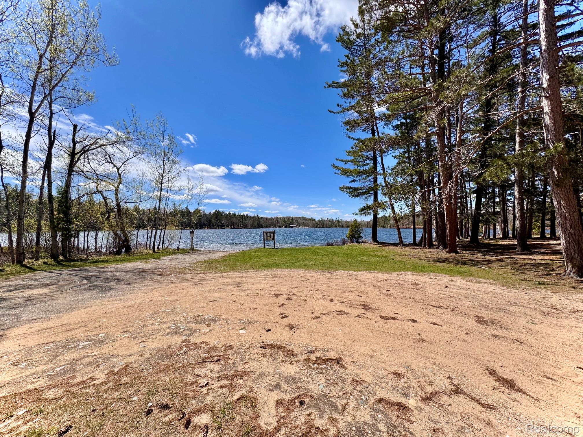 10931 North Roberts Road Frederic, MI 49733 - Photo 32 of 33 View of yard featuring a water view