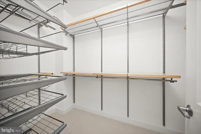 a spacious bathroom with sinks mirror and a bathtub