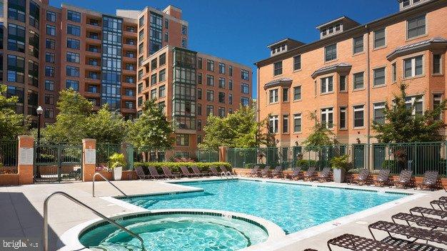 2227 12th Court North Arlington, VA 22201 - Photo 45 of 69 Sunny oasis with a sparkling pool retreat.