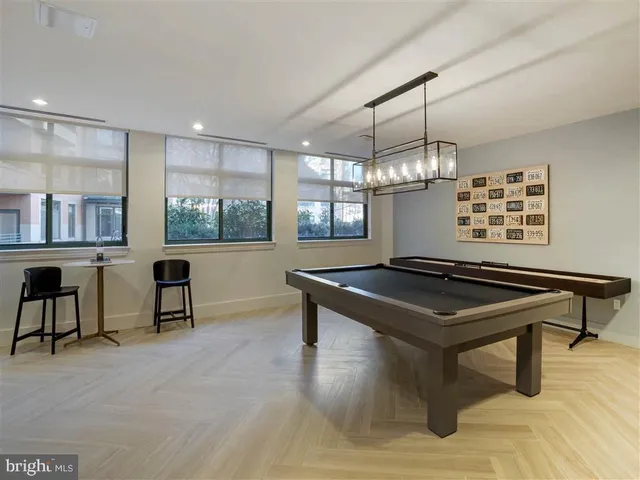 a view of a car parked in front of a house