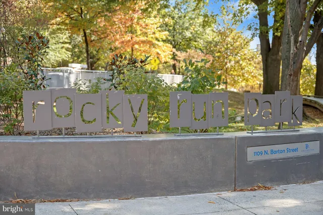 a view of a car parked in front of a house