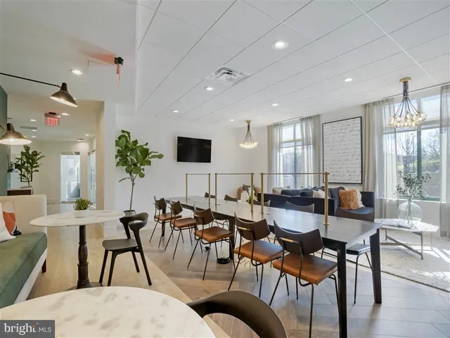 a view of a building with a outdoor seating