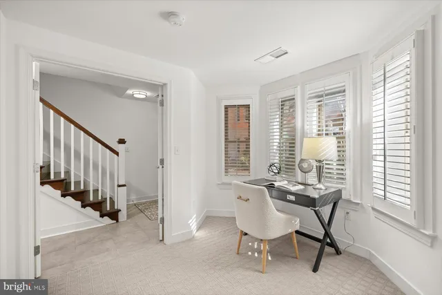 a view of an entryway with hallway