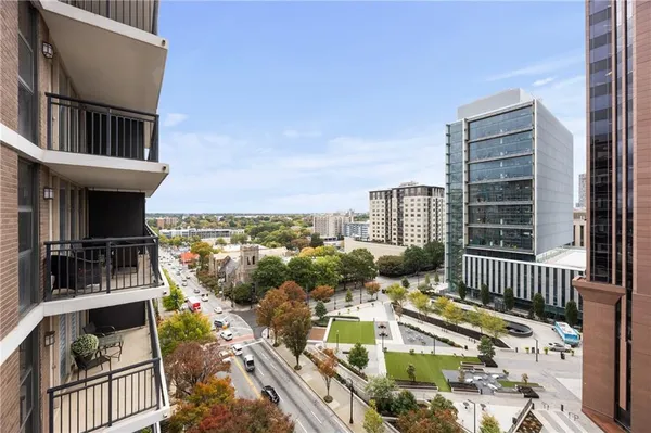 a view of balcony with furniture