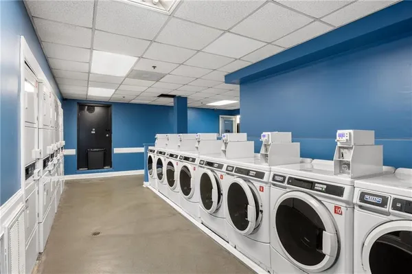 a utility room with dryer and washer