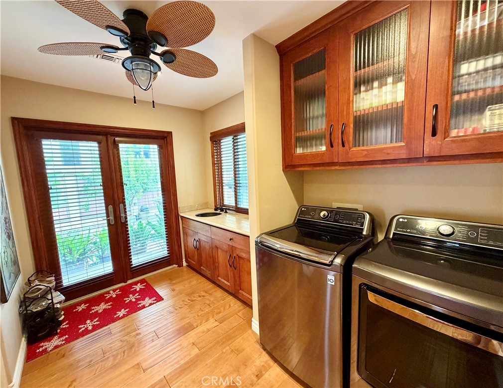 116 Termino Avenue Long Beach, CA 90803 - Photo 28 of 67 Laundry area with french doors leading to backyard