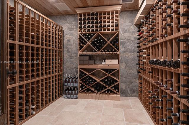 a balcony with wooden floor in front of it