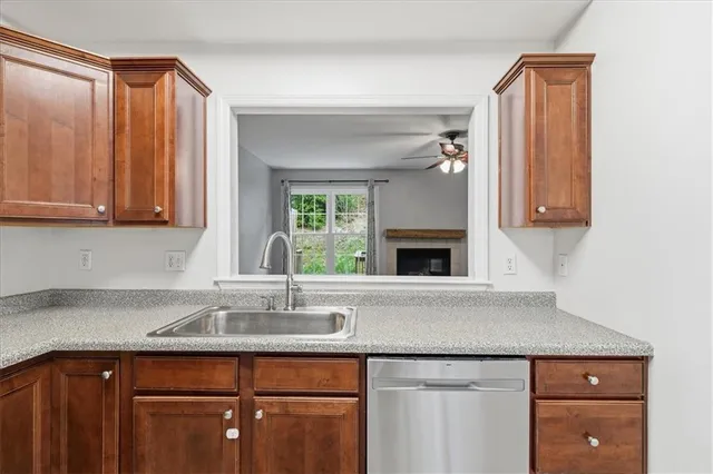 a kitchen with a sink and cabinets