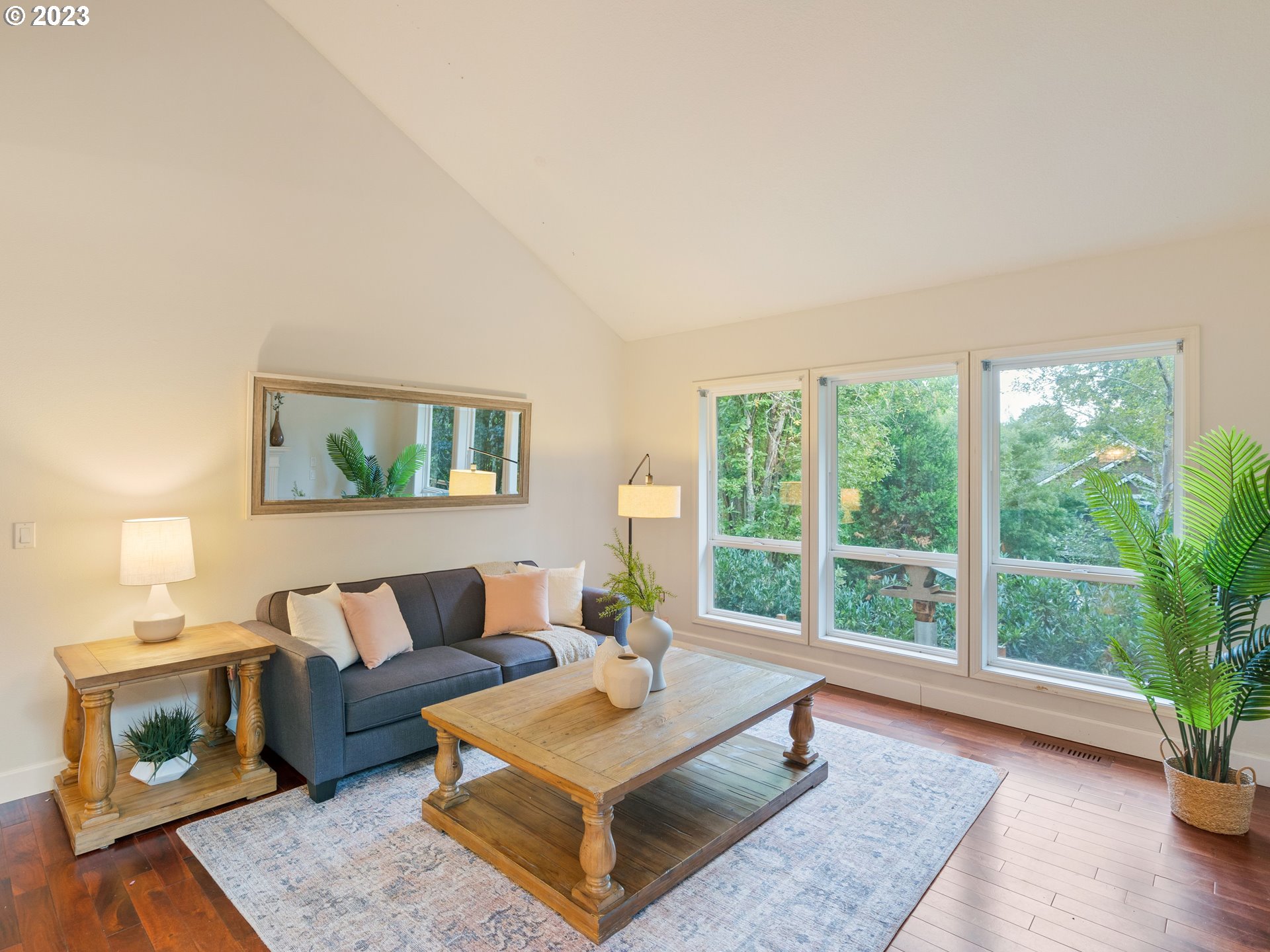 11320 Northwest Kearney Street Portland, OR 97229 - Photo 13 of 16 a living room with furniture and a potted plant