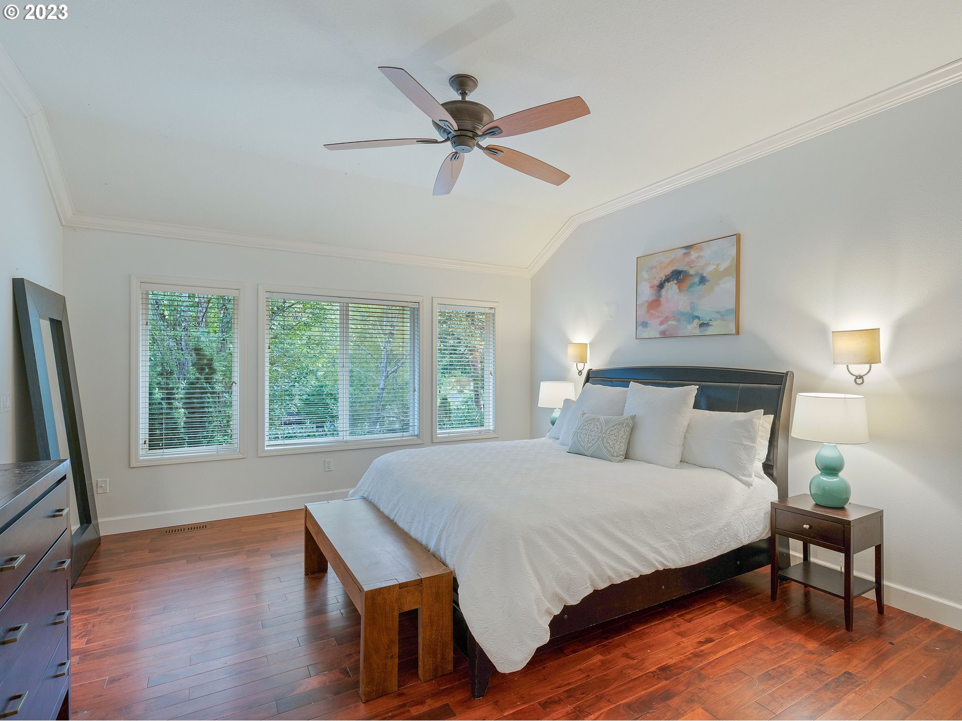 11320 Northwest Kearney Street Portland, OR 97229 - Photo 14 of 16 a bedroom with a bed and a large window