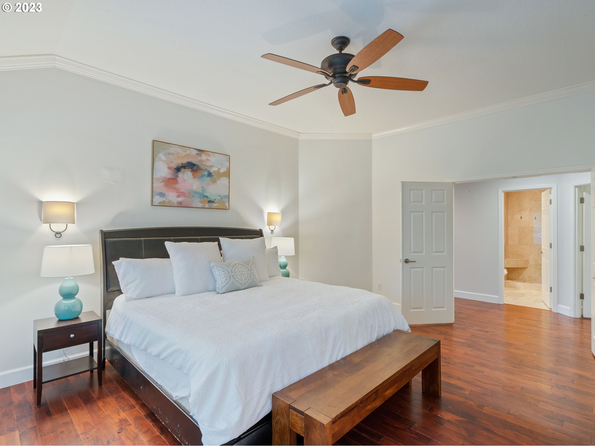 11320 Northwest Kearney Street Portland, OR 97229 - Photo 16 of 16 a bedroom with a bed and a painting on the wall
