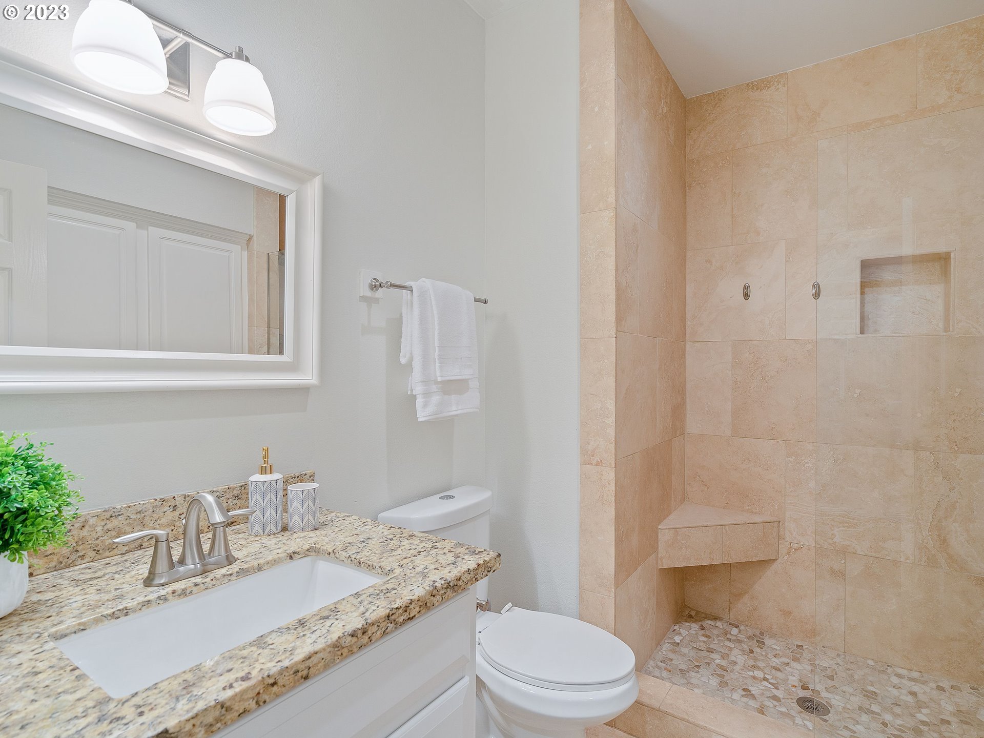 11320 Northwest Kearney Street Portland, OR 97229 - Photo 3 of 16 a bathroom with a granite countertop sink a toilet and shower