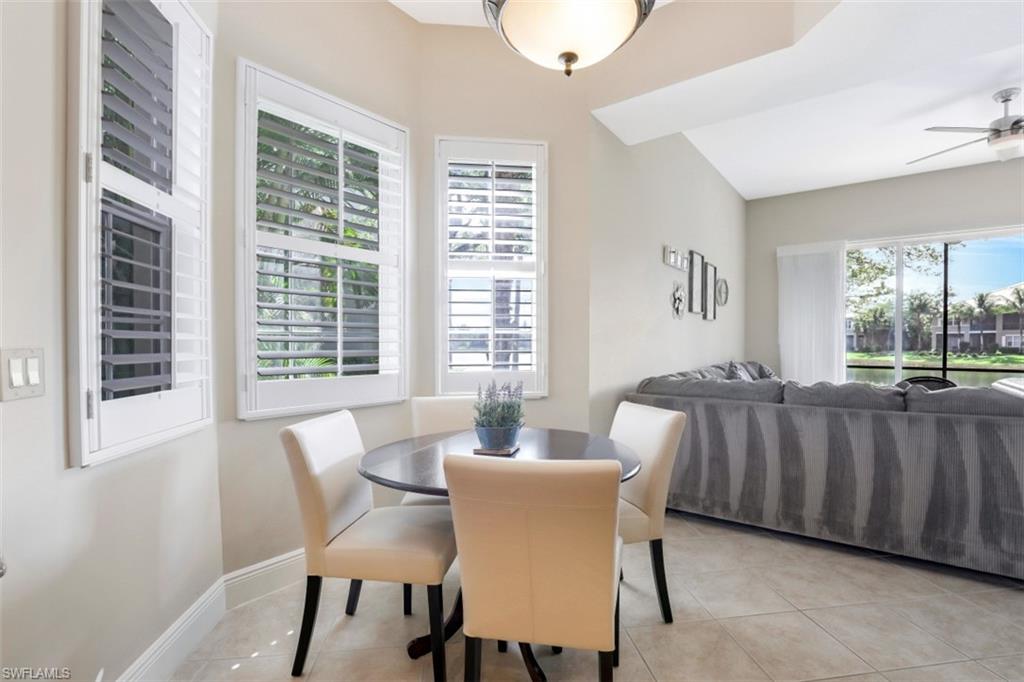 9224 Campanile Circle, Unit 101 Naples, FL 34114 - Photo 18 of 32 a view of a dining room with furniture window and outside view