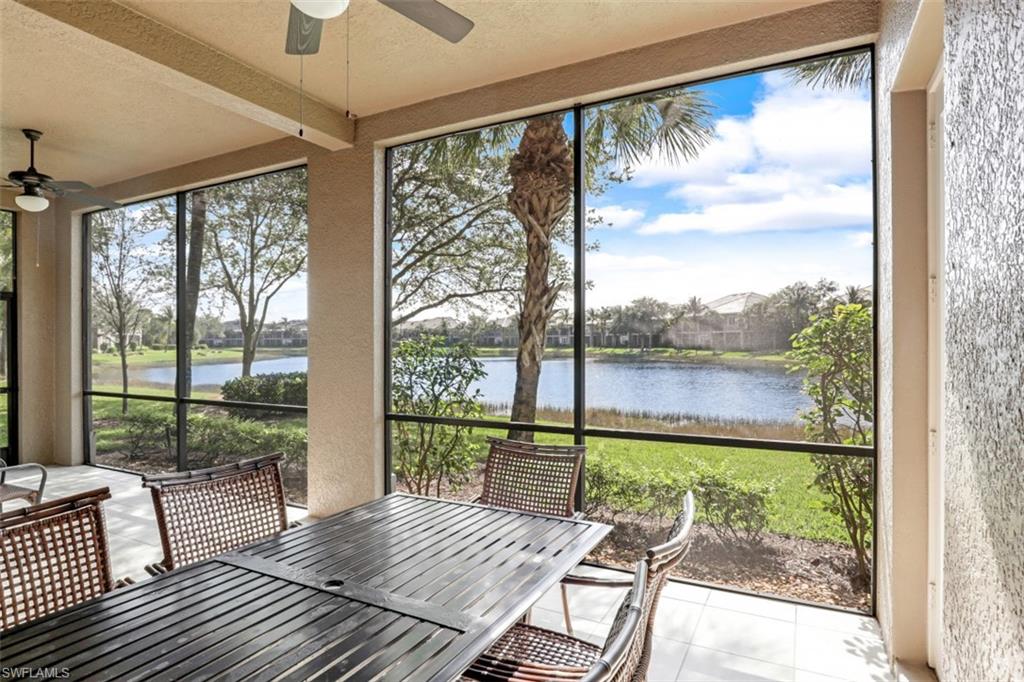 9224 Campanile Circle, Unit 101 Naples, FL 34114 - Photo 26 of 32 a view of a porch with wooden floor and outdoor view