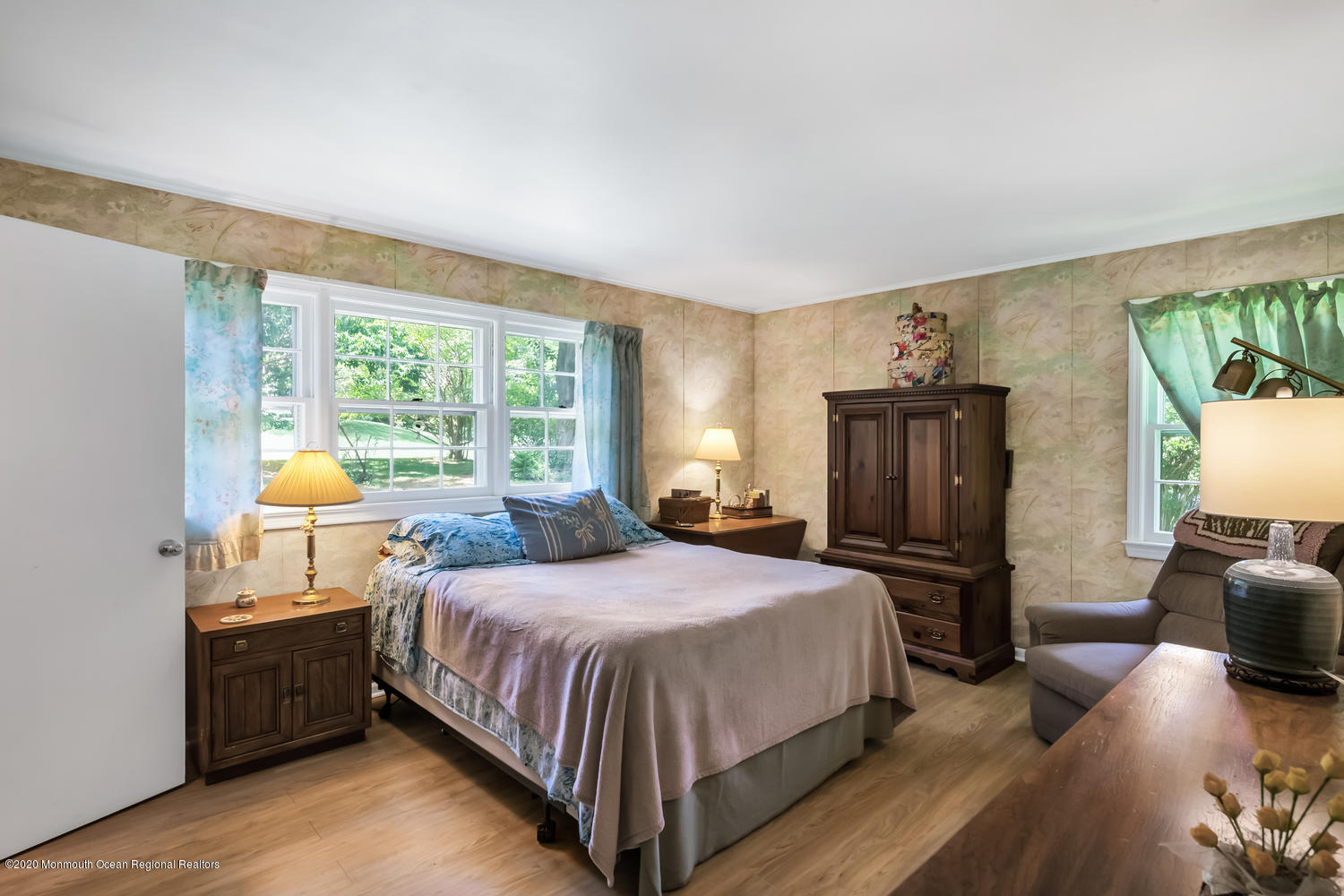 87 Bruce Road Red Bank, NJ 07701 - Photo 11 of 19 a bedroom with a bed and wooden floor