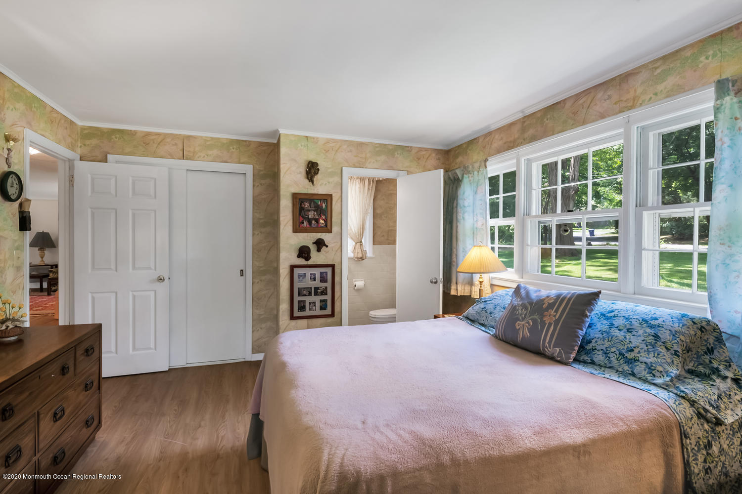 87 Bruce Road Red Bank, NJ 07701 - Photo 12 of 19 a spacious bedroom with a bed and wooden floor