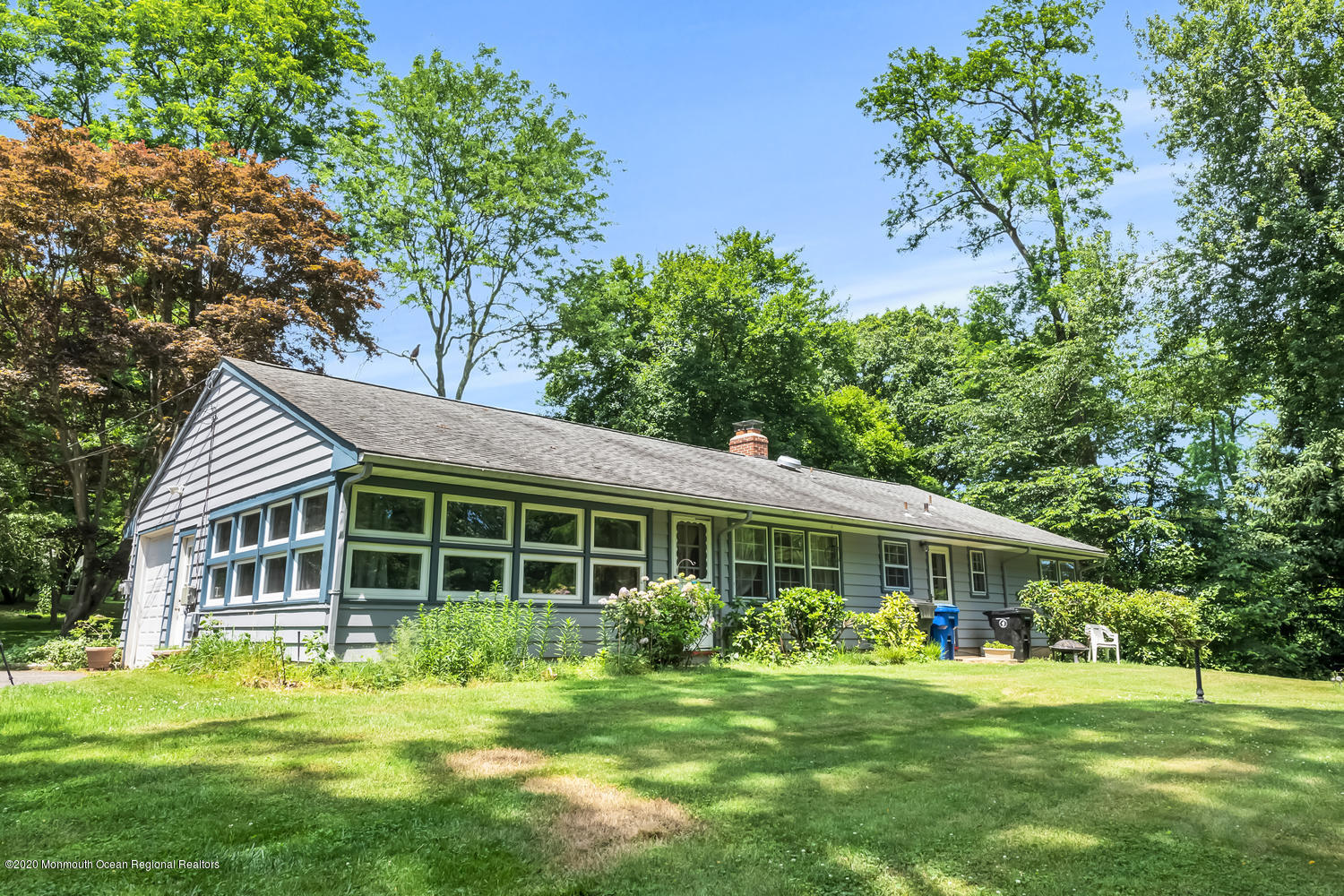 87 Bruce Road Red Bank, NJ 07701 - Photo 17 of 19 a front view of a house with a yard