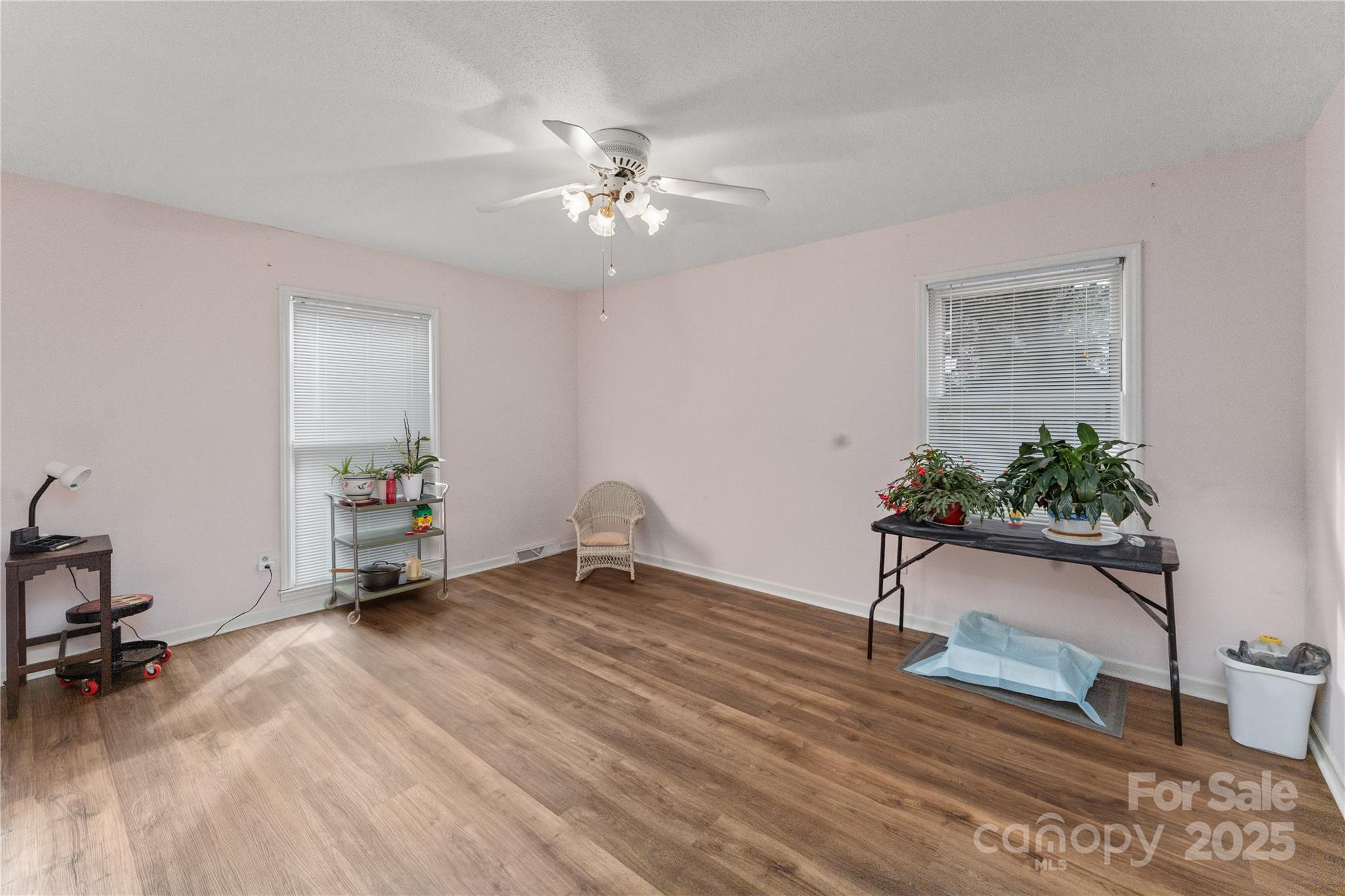 3614 McKee Road Charlotte, NC 28270 - Photo 18 of 29 a view of a workspace with furniture and a potted plant