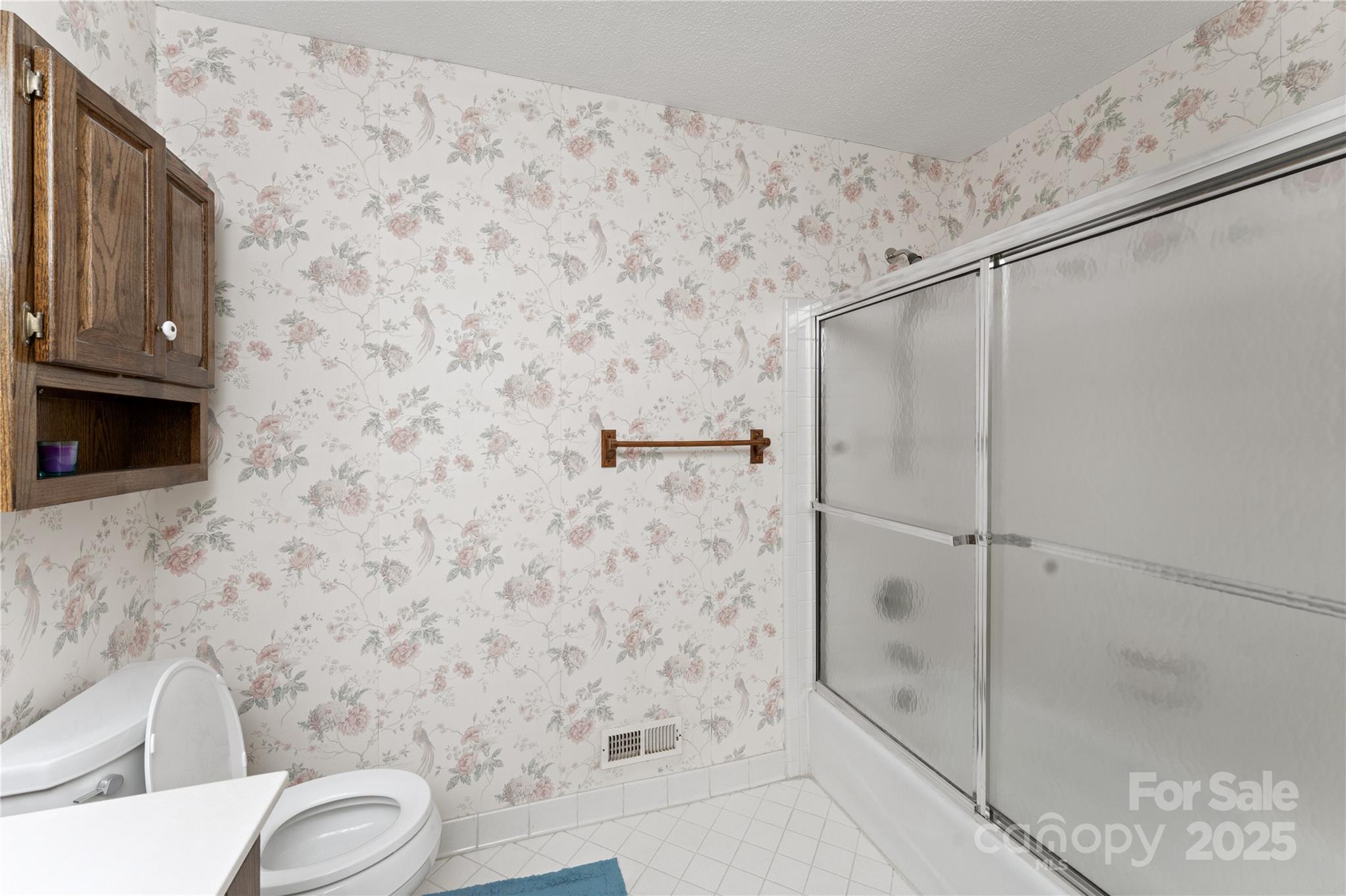 3614 McKee Road Charlotte, NC 28270 - Photo 22 of 29 a bathroom with a toilet and a shower
