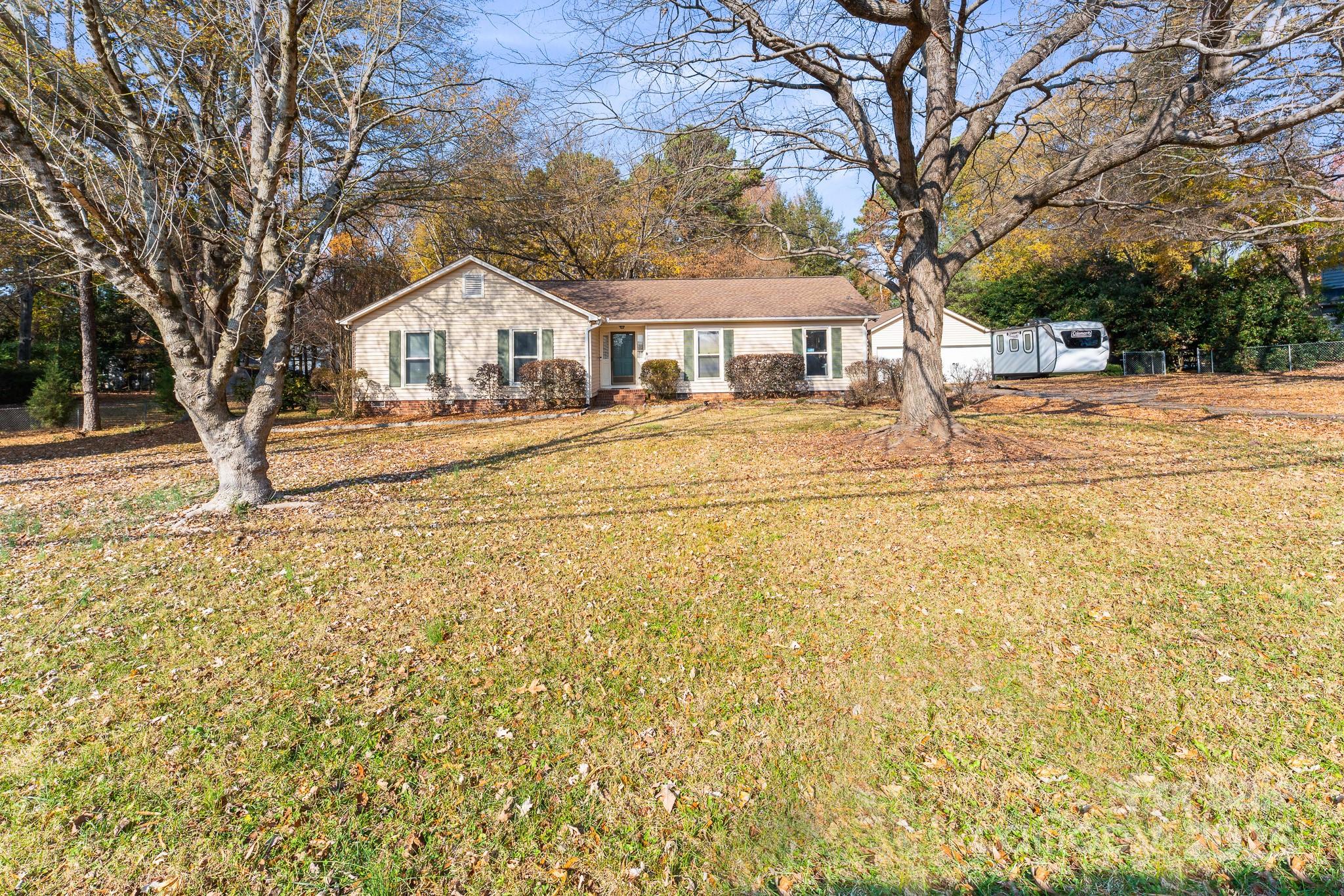 3614 McKee Road Charlotte, NC 28270 - Photo 23 of 29 a front view of a house with a yard