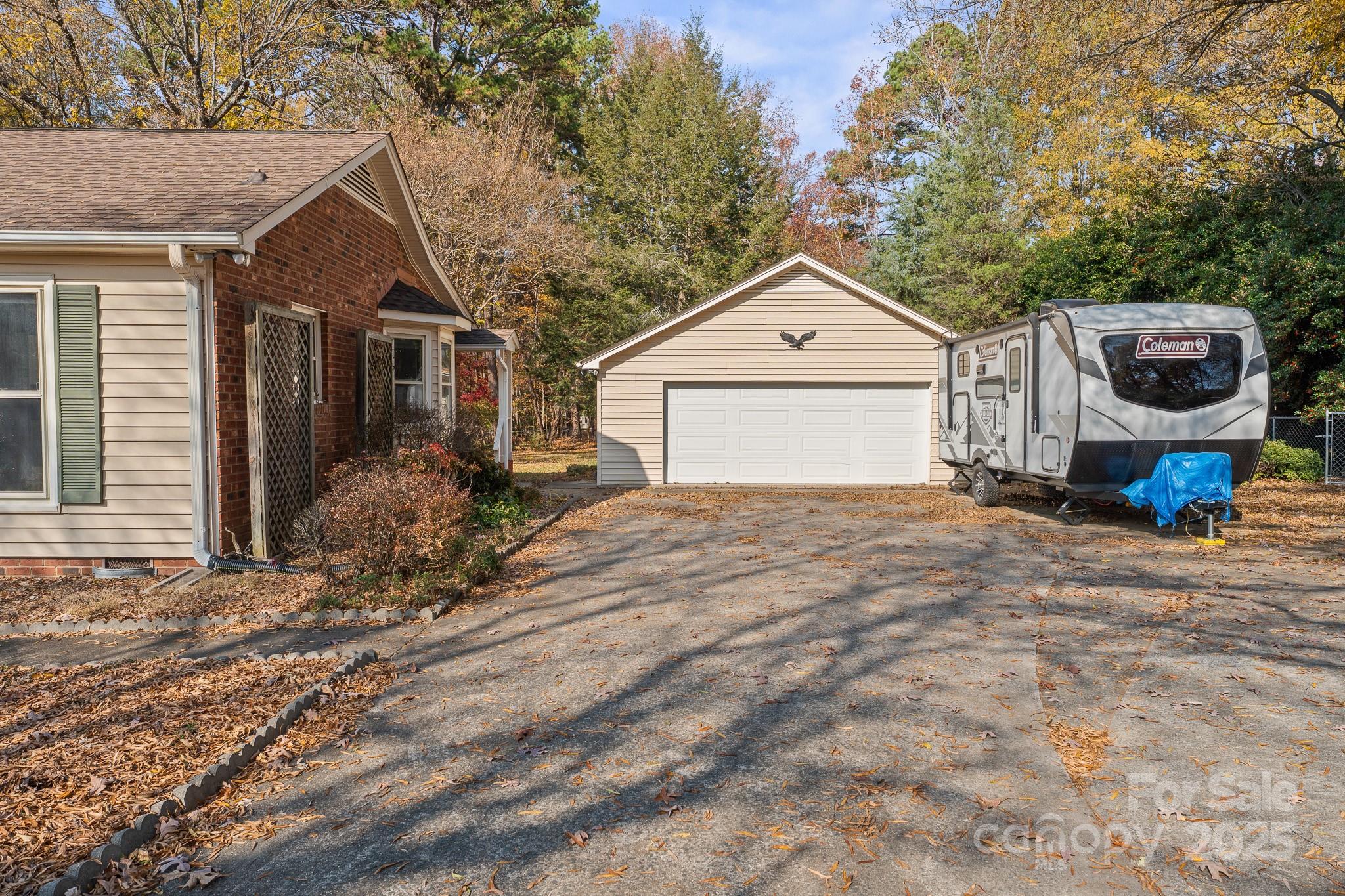 3614 McKee Road Charlotte, NC 28270 - Photo 25 of 29 a view of a house with a yard and large tree