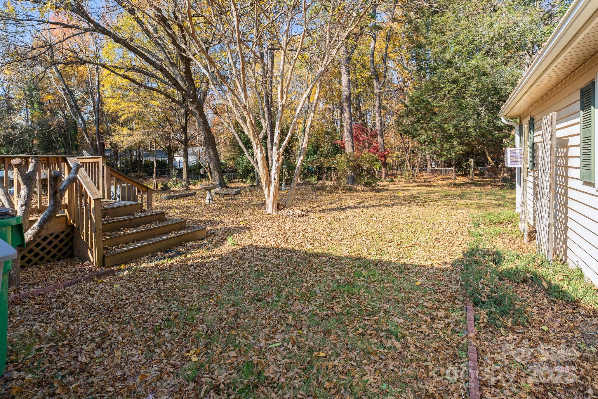 3614 McKee Road Charlotte, NC 28270 - Photo 26 of 29 a view of a yard with wooden fence