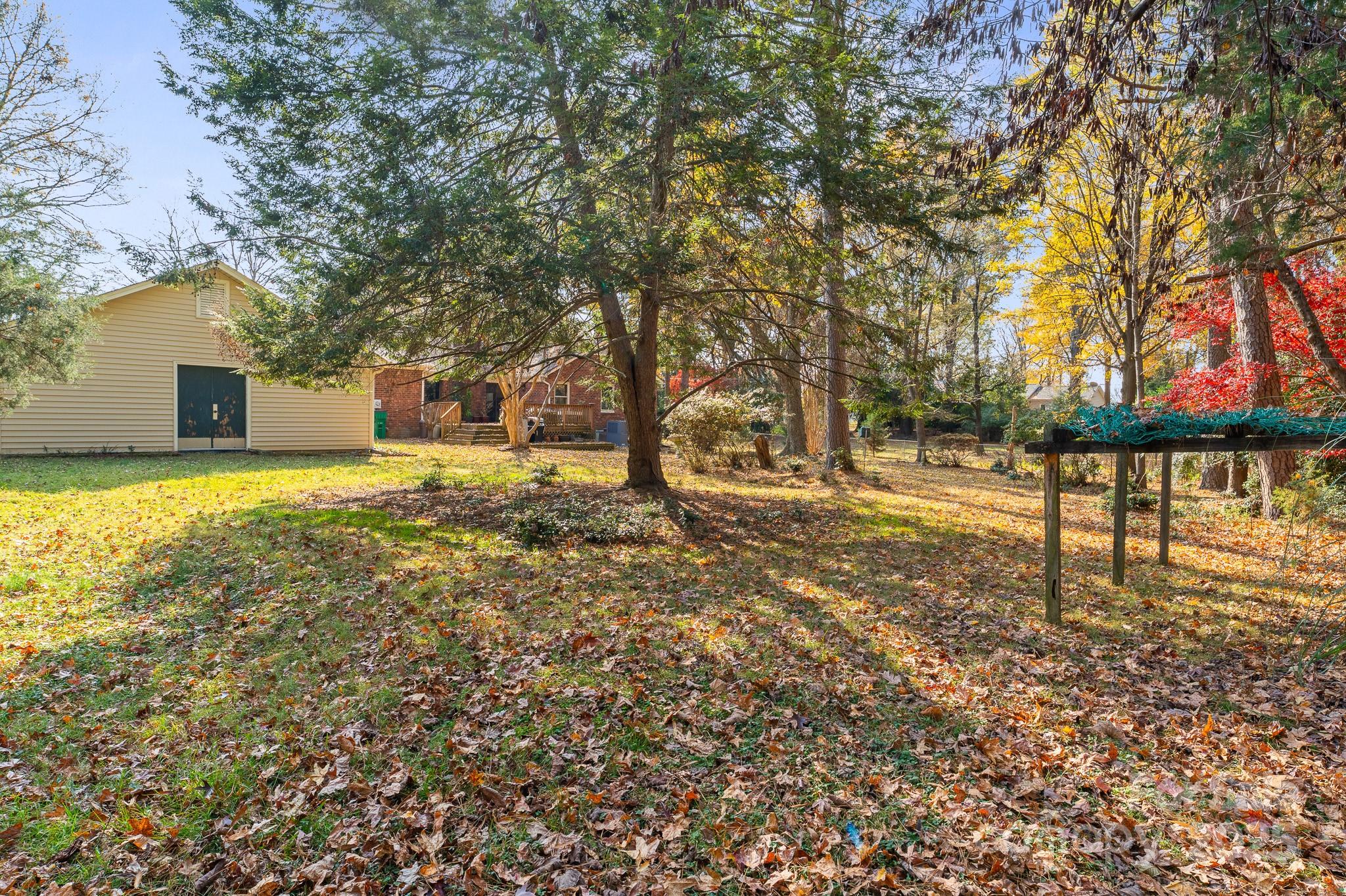 3614 McKee Road Charlotte, NC 28270 - Photo 28 of 29 a view of a yard with a tree