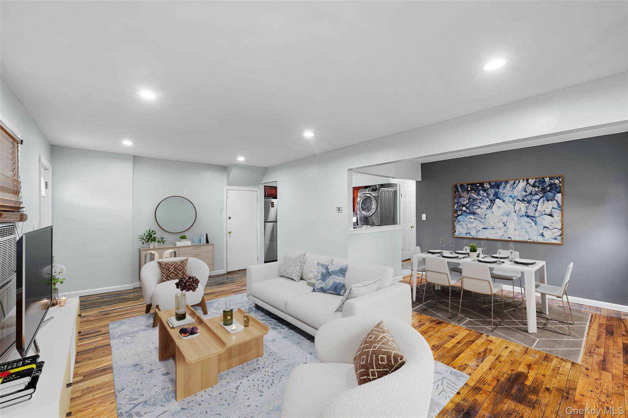 172-04 Amelia Road Queens, NY 11434 - Photo 5 of 25 a living room with furniture and a flat screen tv