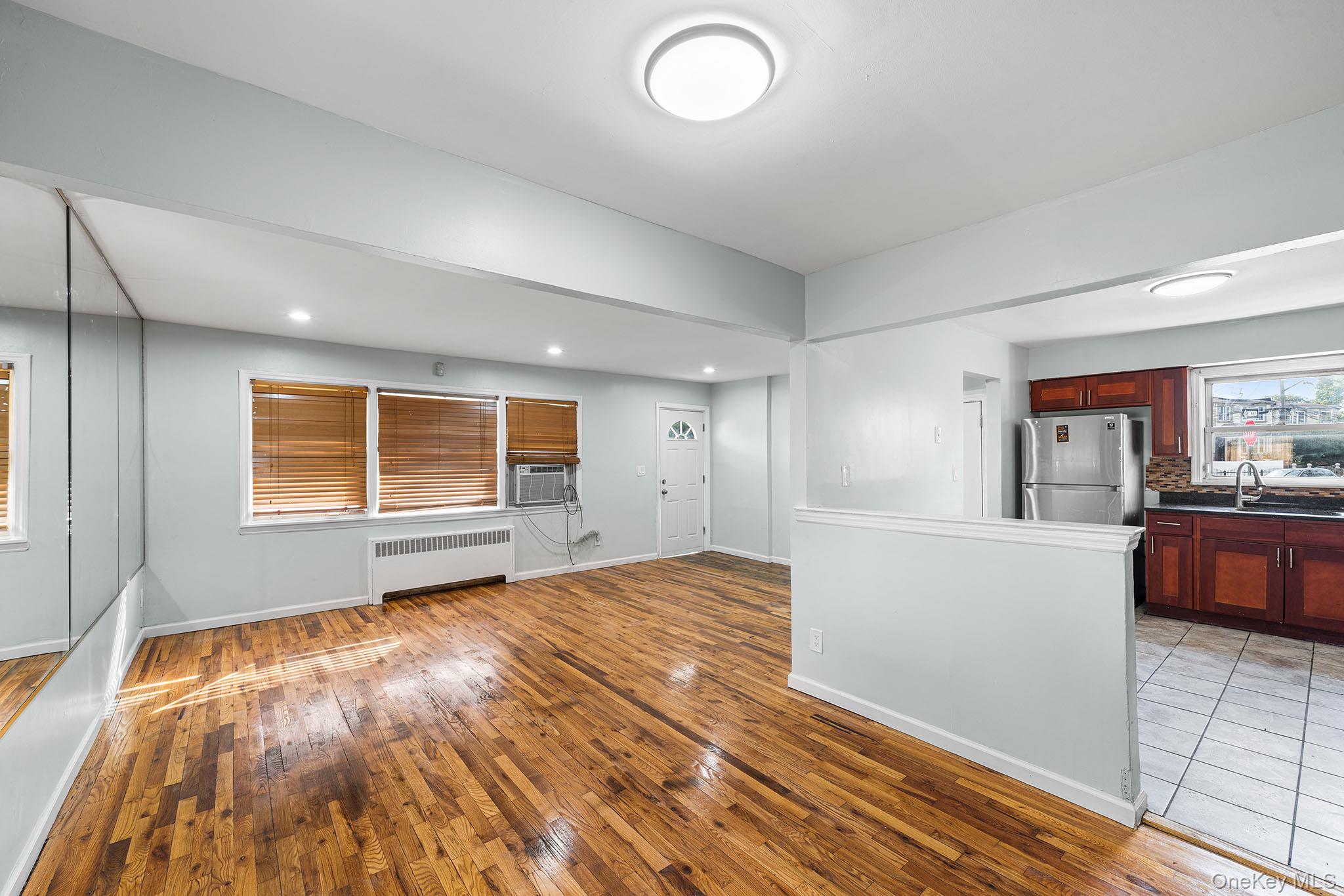 172-04 Amelia Road Queens, NY 11434 - Photo 10 of 25 a view of livingroom with hardwood and furniture