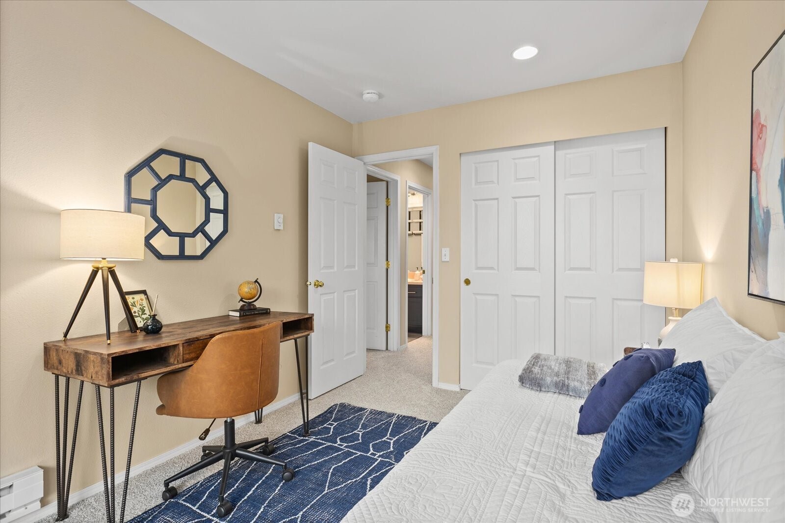 2325 Harbor Avenue Southwest, Unit B1 Seattle, WA 98126 - Photo 23 of 37 a bedroom with a bed a dresser and chair