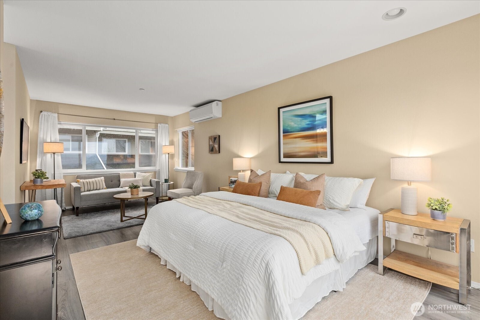 2325 Harbor Avenue Southwest, Unit B1 Seattle, WA 98126 - Photo 24 of 37 a bedroom with a large bed and a couch