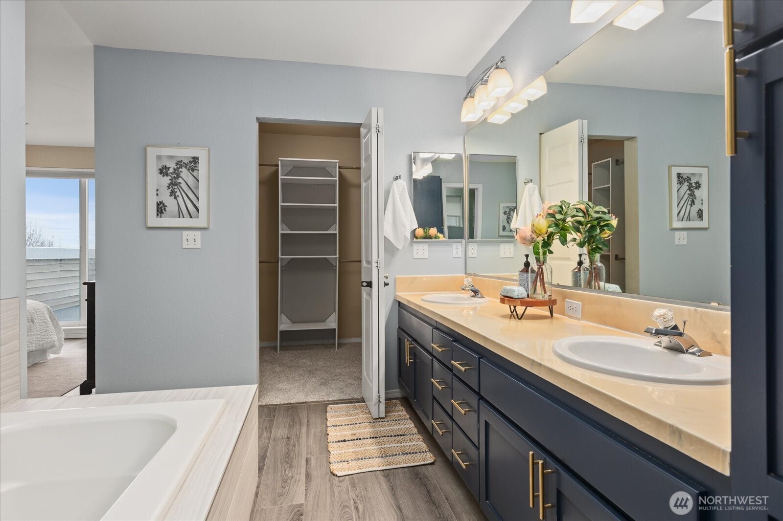 2325 Harbor Avenue Southwest, Unit B1 Seattle, WA 98126 - Photo 31 of 37 a spacious bathroom with a tub sink and mirror