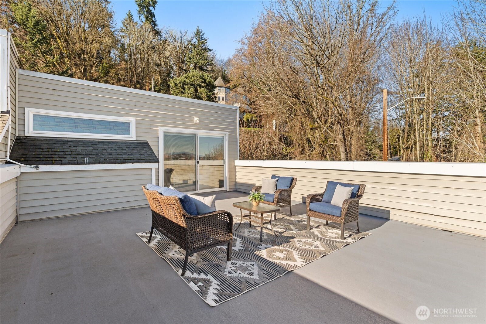 2325 Harbor Avenue Southwest, Unit B1 Seattle, WA 98126 - Photo 32 of 37 a backyard of a house with outdoor seating