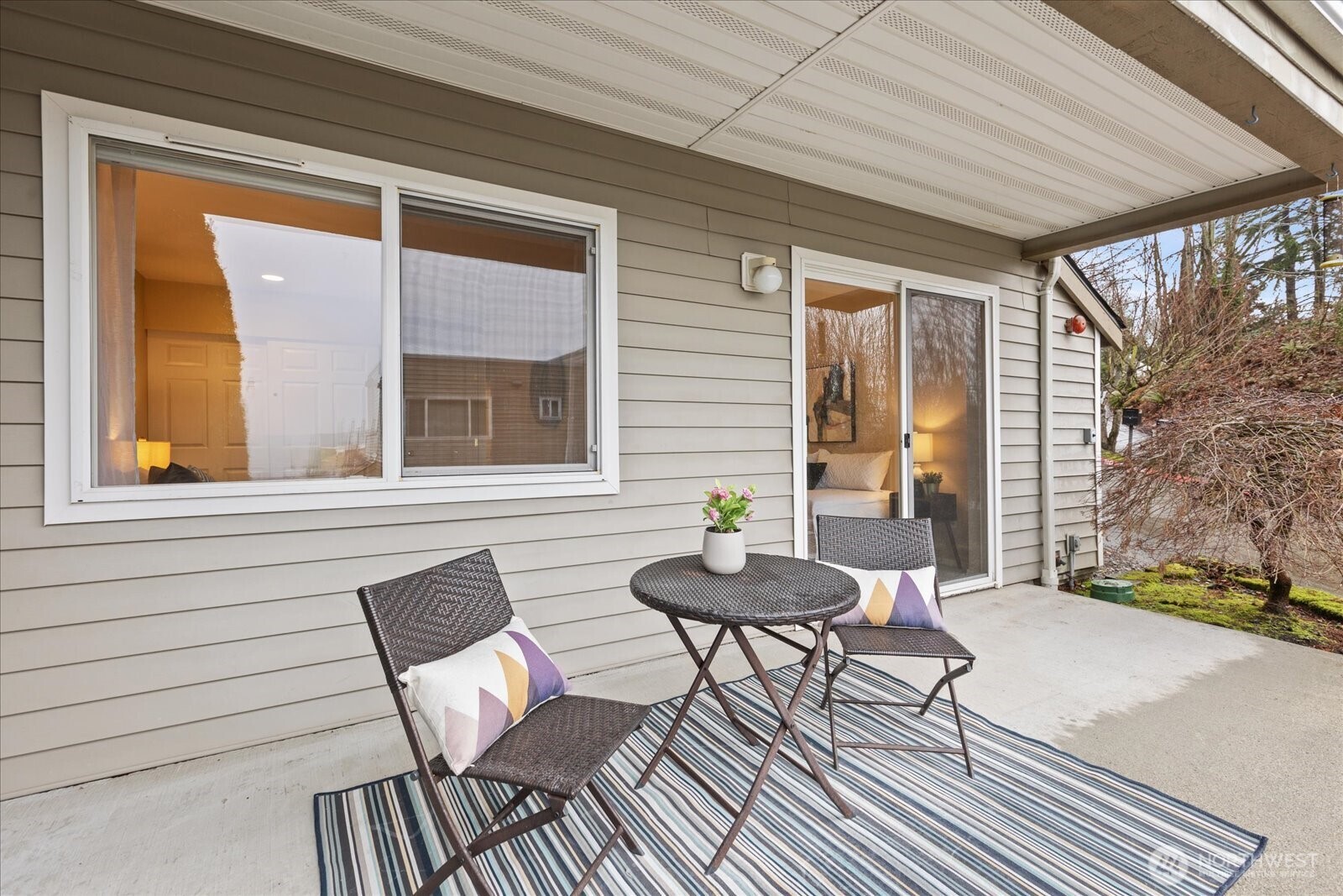 2325 Harbor Avenue Southwest, Unit B1 Seattle, WA 98126 - Photo 33 of 37 a balcony with wooden floor and a couch