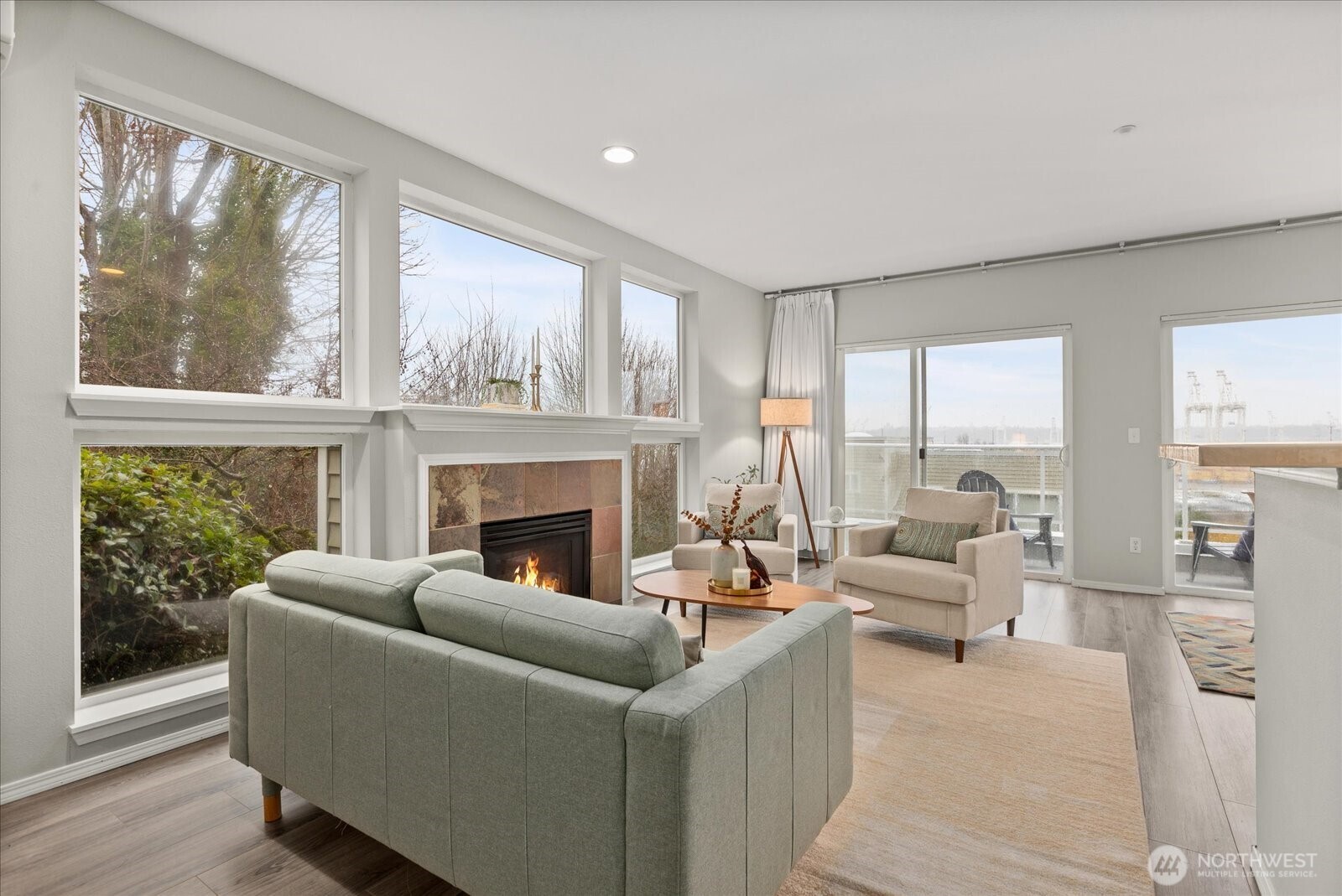 2325 Harbor Avenue Southwest, Unit B1 Seattle, WA 98126 - Photo 9 of 37 a living room with furniture and a large window