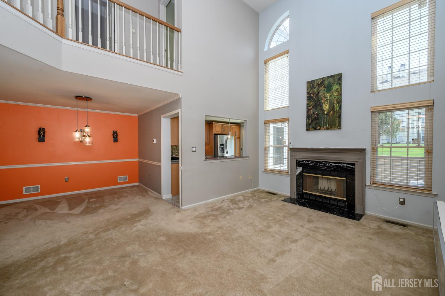 1907 Stech Drive Bridgewater, NJ 08807 - Photo 13 of 55 an empty room with windows and fireplace