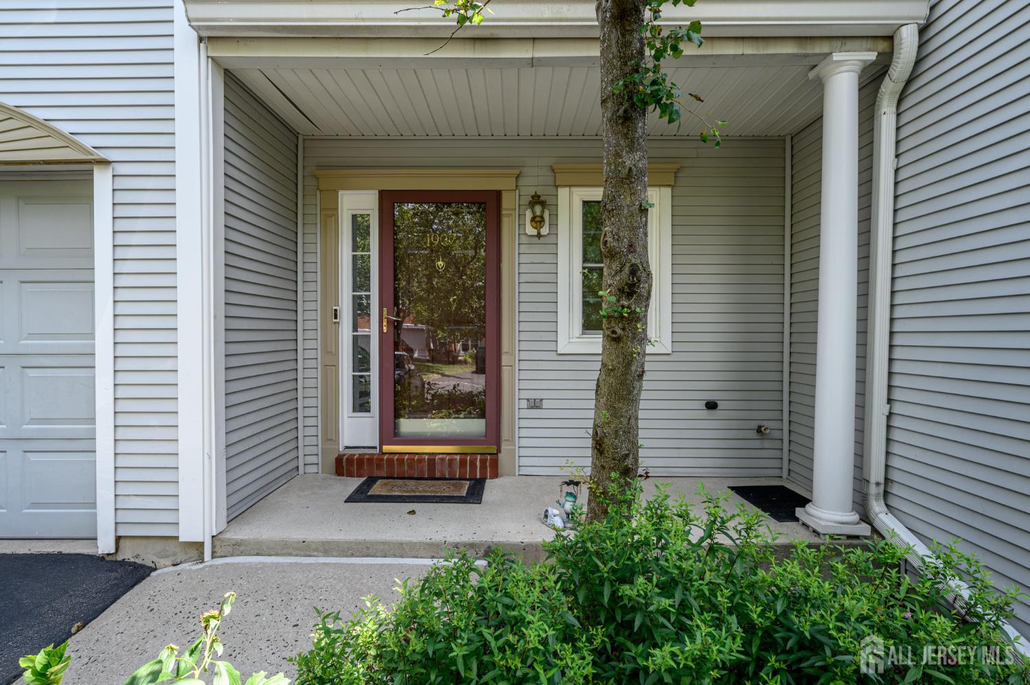 1907 Stech Drive Bridgewater, NJ 08807 - Photo 2 of 55 a front view of a house with a garage