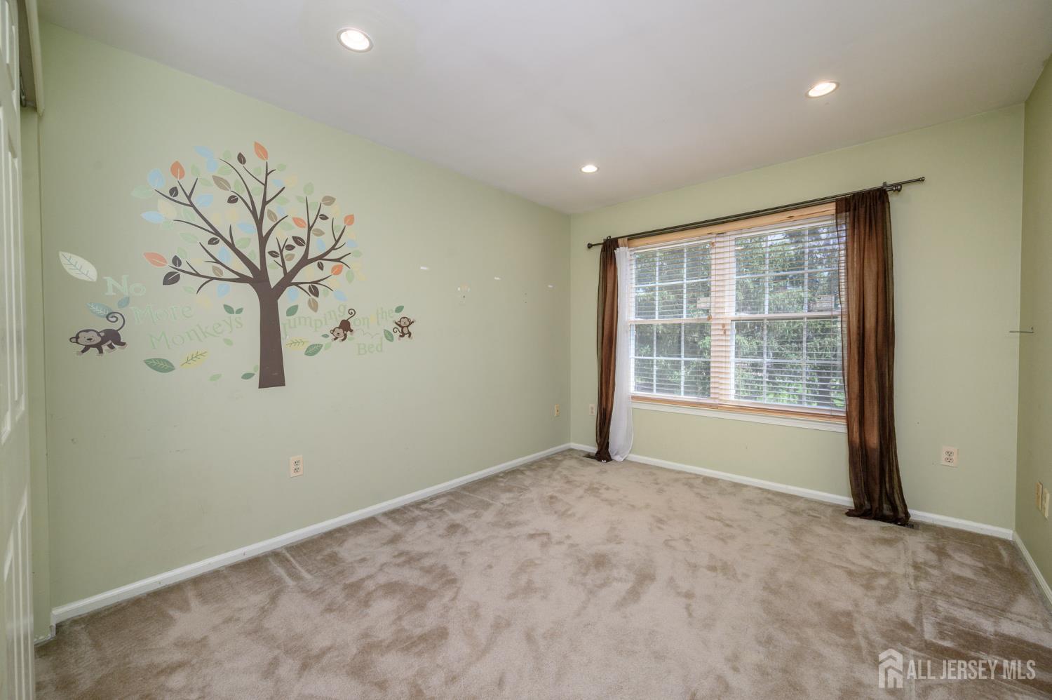1907 Stech Drive Bridgewater, NJ 08807 - Photo 21 of 55 a view of an empty room with a window
