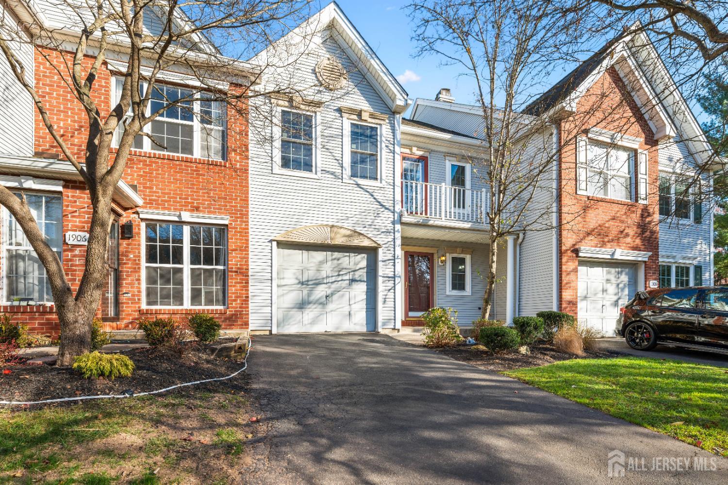 1907 Stech Drive Bridgewater, NJ 08807 - Photo 53 of 55 a front view of a house with a yard