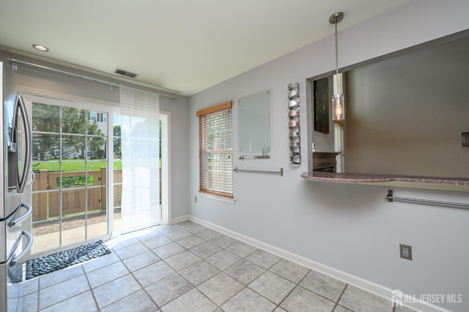 1907 Stech Drive Bridgewater, NJ 08807 - Photo 8 of 55 a view of kitchen with furniture and large window