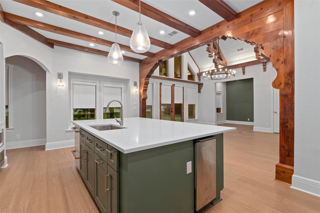 124 Garza Road Shady Shores, TX 76208 - Photo 13 of 40 Kitchen island includes an ice maker