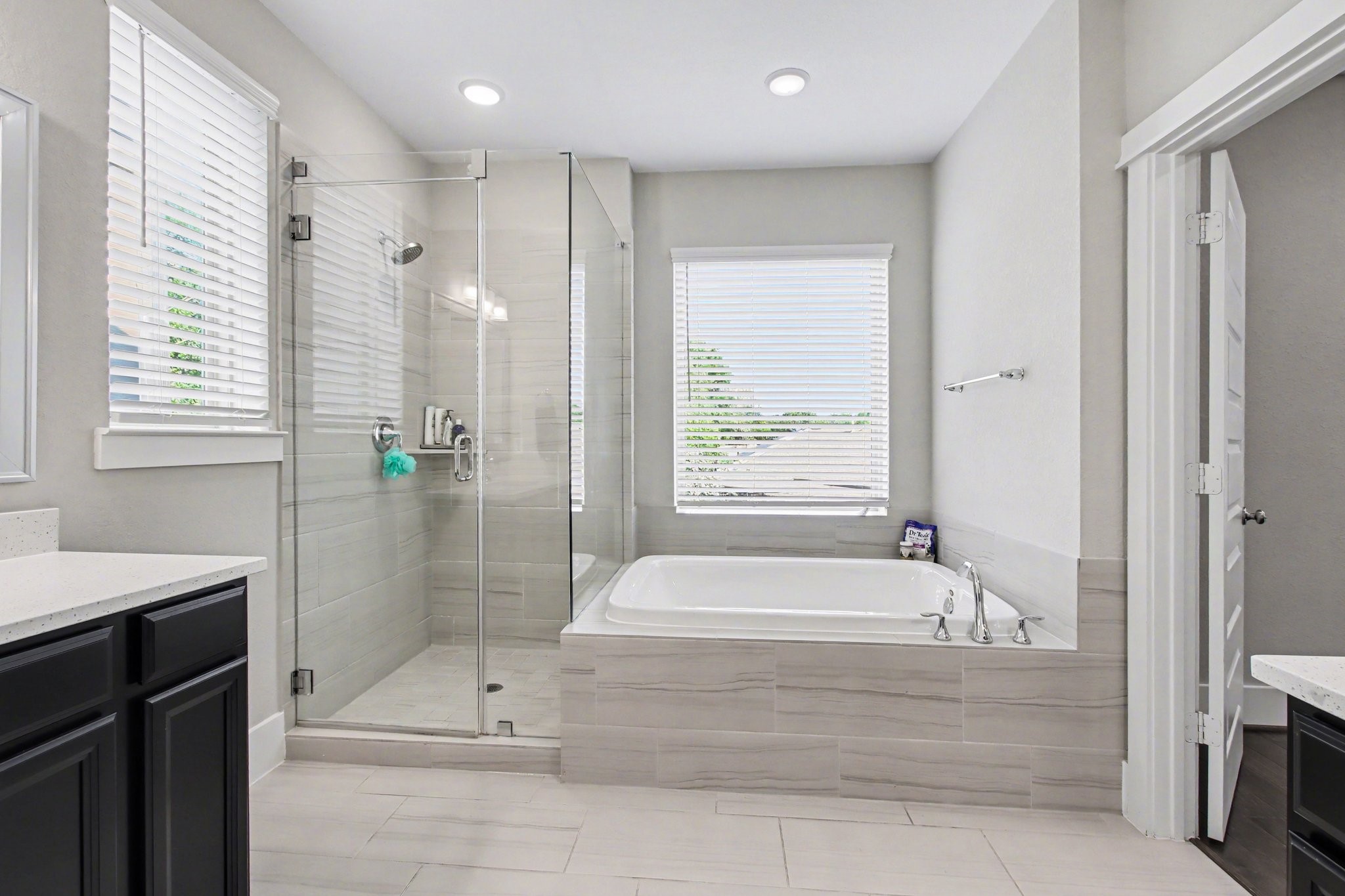 2007 Tarfite Place Houston, TX 77077 - Photo 14 of 24 a bathroom with a bathtub a shower and a sink