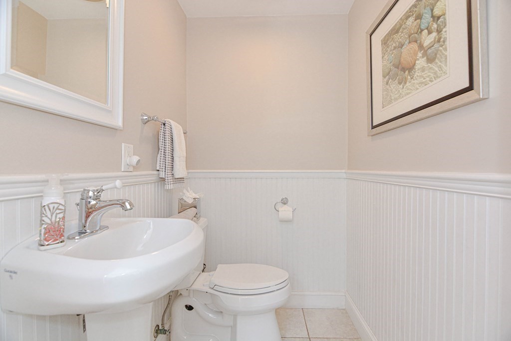 520 Burroughs Road Boxborough, MA 01719 - Photo 11 of 34 a bathroom with a toilet sink and mirror