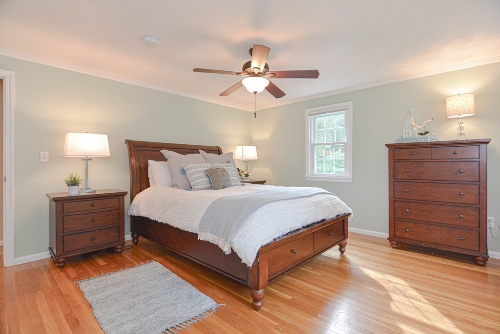 520 Burroughs Road Boxborough, MA 01719 - Photo 12 of 34 a bedroom with a bed and a dresser