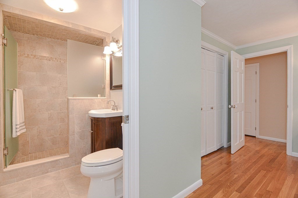 520 Burroughs Road Boxborough, MA 01719 - Photo 14 of 34 a bathroom with a toilet and a sink