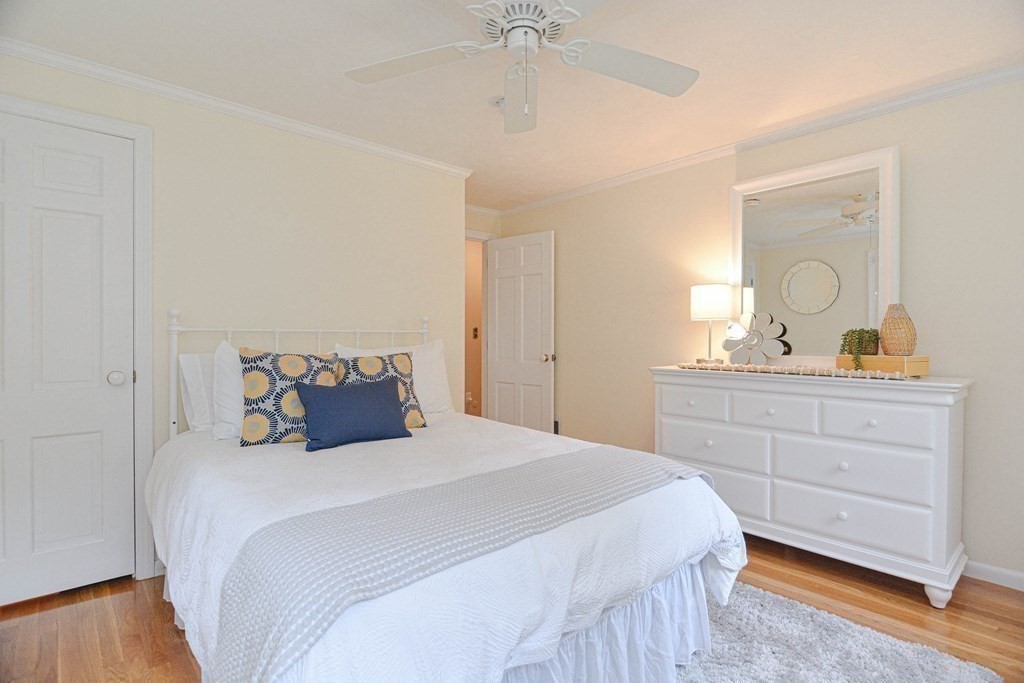 520 Burroughs Road Boxborough, MA 01719 - Photo 18 of 34 a bedroom with a bed and a dresser